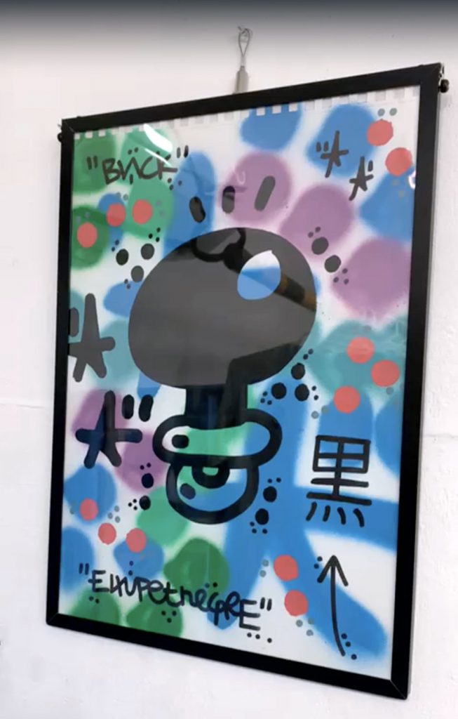Arte urbano el xupet negre en Japón